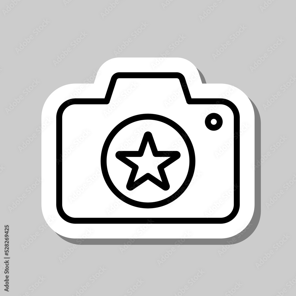 Photo camera with star simple icon vector. Flat design. Sticker with shadow on gray background Photo camera with star simple icon vector. Flat design. Sticker with shadow on gray background