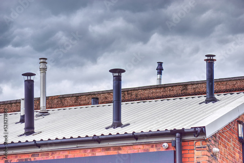 what a load of chimney on a roof environmental impact editorial image  photo