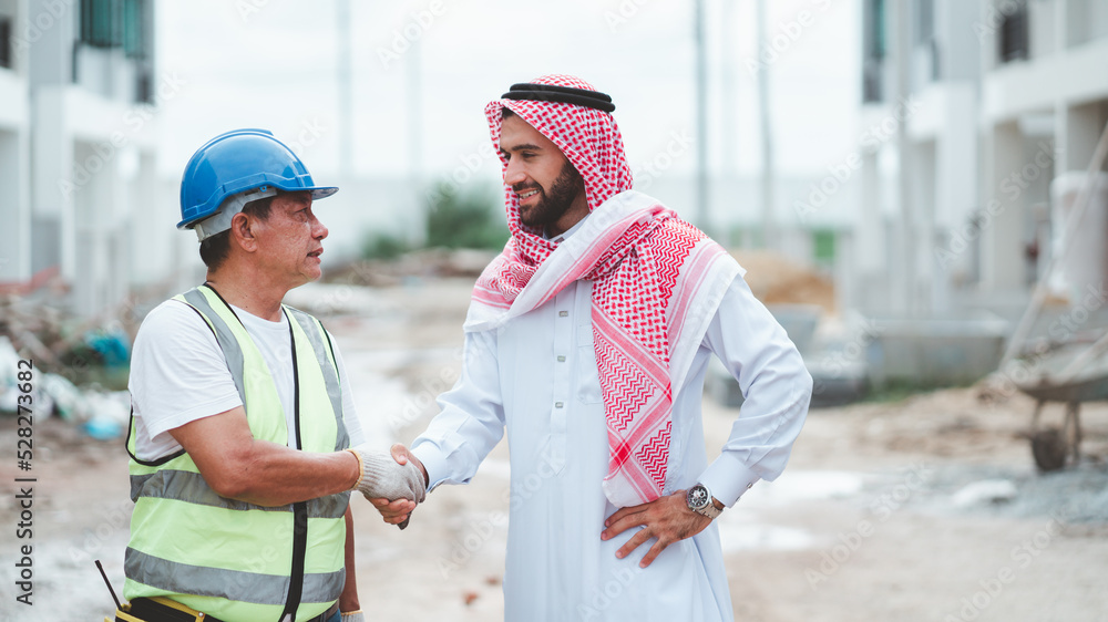 Arab Muslims are engaged in architecture business and are architects.Saudi manager organizes confidence meeting with partners. human achievement architecture construction site. Arab Muslims are engaged in architecture business and are architects.Saudi manager organizes confidence meeting with partners. human achievement architecture construction site.