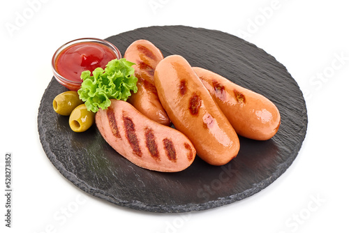 Grilled munich sausages, isolated on white background.