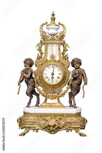 Antique decorated golden clock isolated