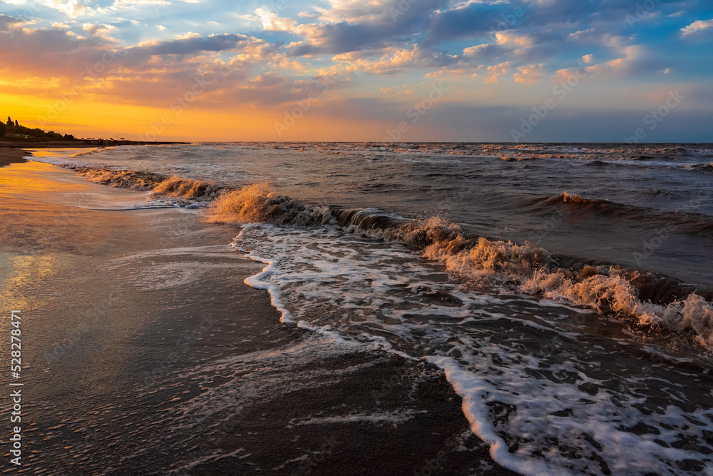 Beautiful sunset on the sea coast