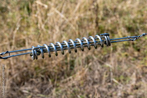 tension spring for metal fence