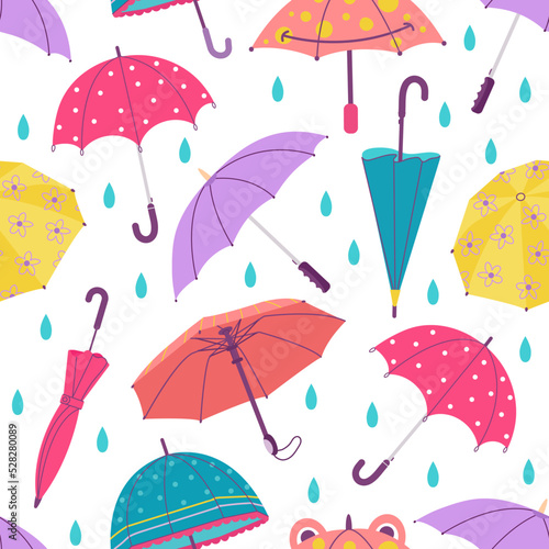 Umbrella and rain drops seamless pattern. Hand drawn doodle umbrellas, autumn or spring season weather. Abstract cute childish decent vector background