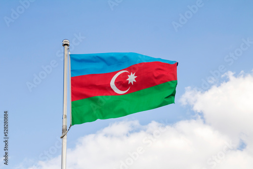 Azerbaijan flag is isolated on the blue sky