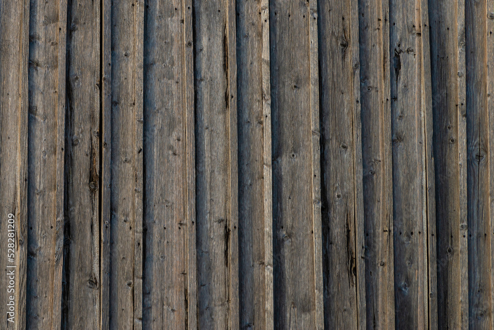 Rustic Brown Weathered Wood Grain Old Dark rough log house roof wall Weathered boards Facade barn natural patterns Vintage scratches, cracks. Rustic Brown Weathered Wood Grain Old Dark rough log house roof wall Weathered boards Facade barn natural patterns Vintage scratches, cracks.