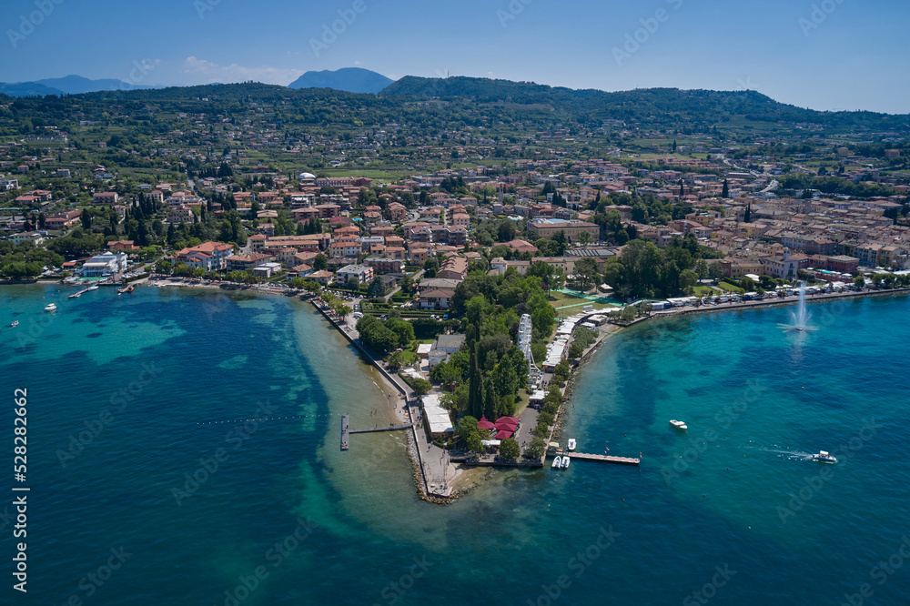 Aerial panorama coastline of Bardolino city on Lake Garda Italy.