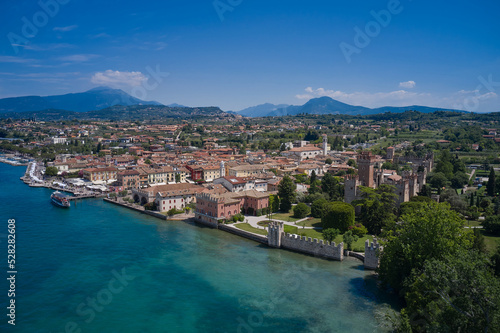 The historical part of the city of Lazise, coastline. Aerial view of Lazise city, Verona. Drone view of Lazise town on Lake Garda Italy.