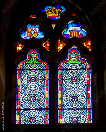 Colorful stained glass window in the Santa Ana chapel of the Royal Palace of Almudaina in Palma de Mallorca (Spain) photo