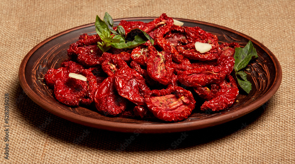 Bowl of sun dried tomatoes, top view Bowl of sun dried tomatoes, top view