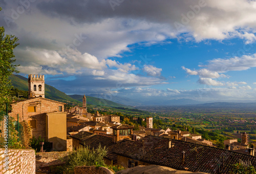 View of Assisi charming medieval historical center with Umbria countryside
