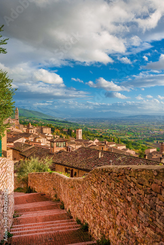 View of Assisi charming medieval historical center with Umbria countryside
