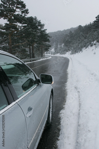 Car on a snowy mountain road