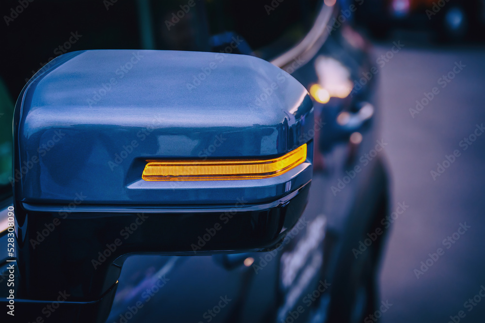 close-up of LED turn signal on side rearview mirror of car, modern automotive technology close-up of LED turn signal on side rearview mirror of car, modern automotive technology