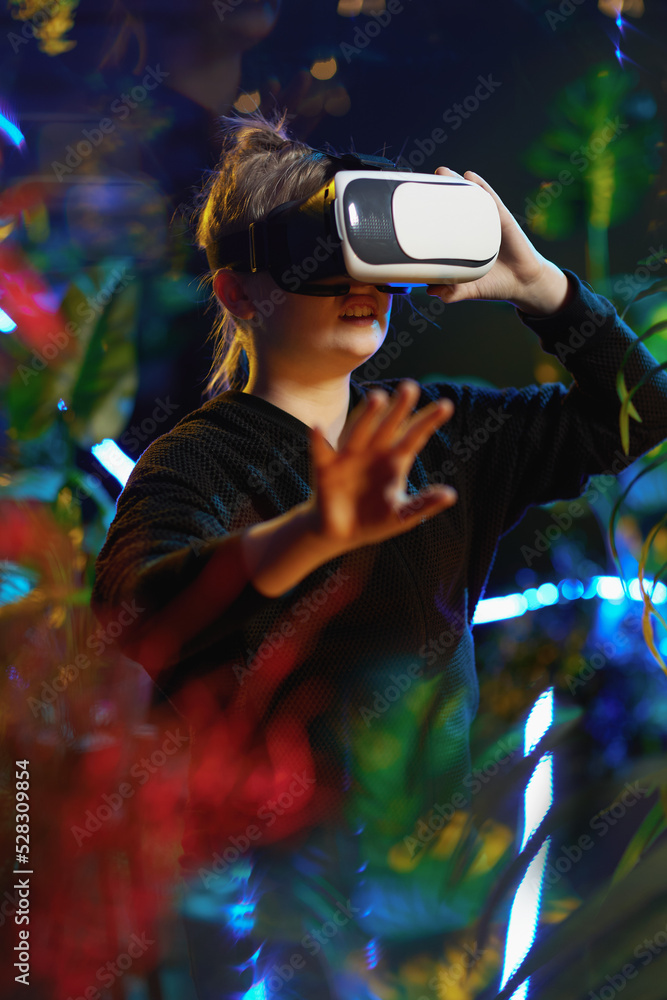 modern child in metaverse in vr headset exploring modern child in metaverse in vr headset exploring