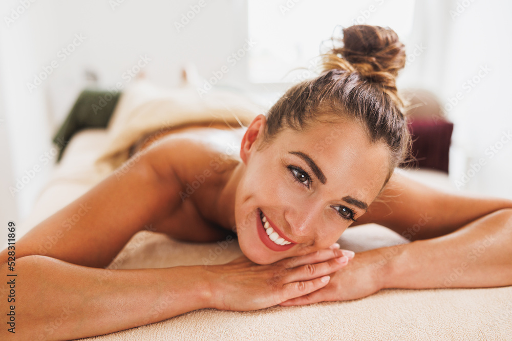 Woman Enjoying Massage In Spa Centre Woman Enjoying Massage In Spa Centre