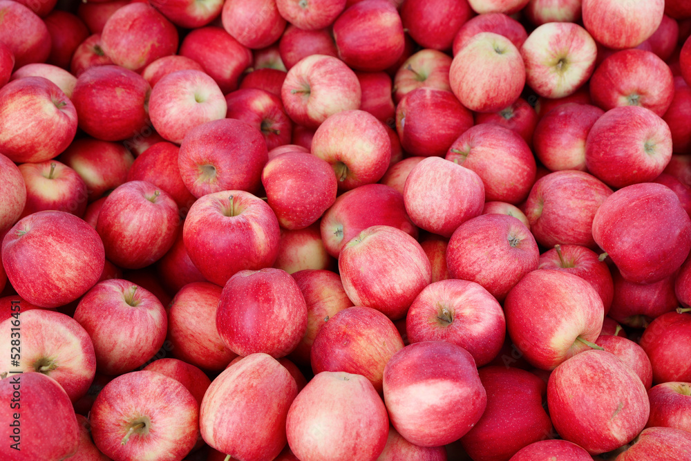 Fresh red apples in crate in the shop Fresh red apples in crate in the shop