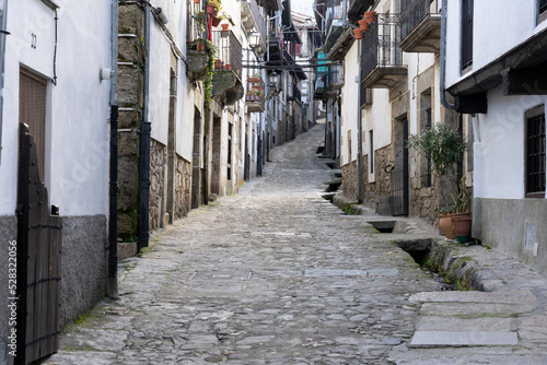 Beautiful streets of Candelario village with its white houses. Salamanca, Castilla y Leon, Spain. photo