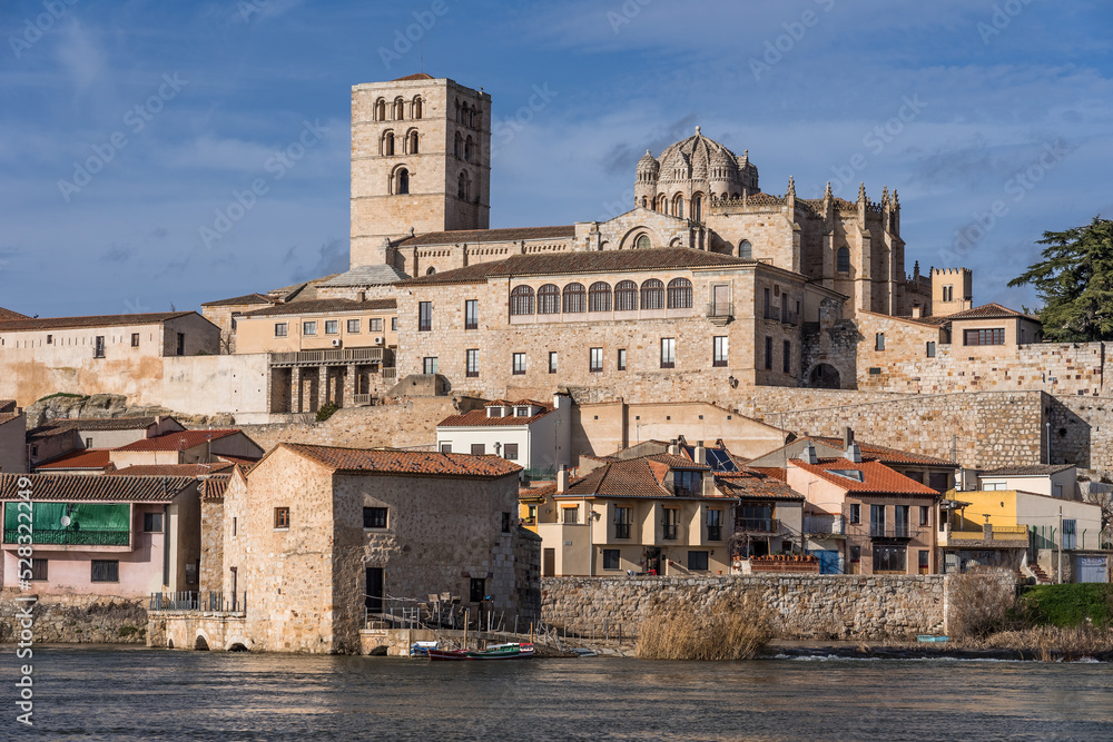 Zamora Romanesque cathedral and bell towers since Duero river. Spain
