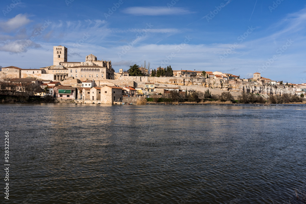 Zamora Romanesque cathedral and bell towers since Duero river. Spain