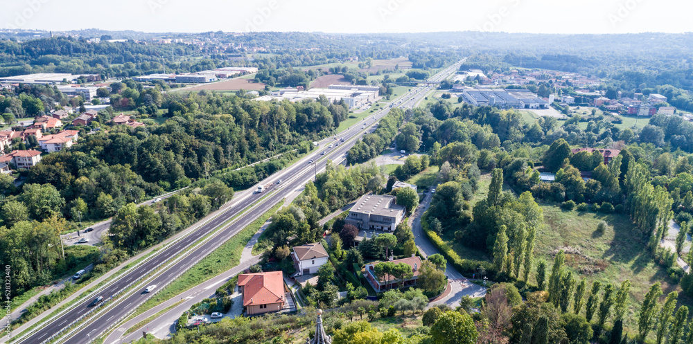 Aerial drone view of a motorway in the Italian countryside