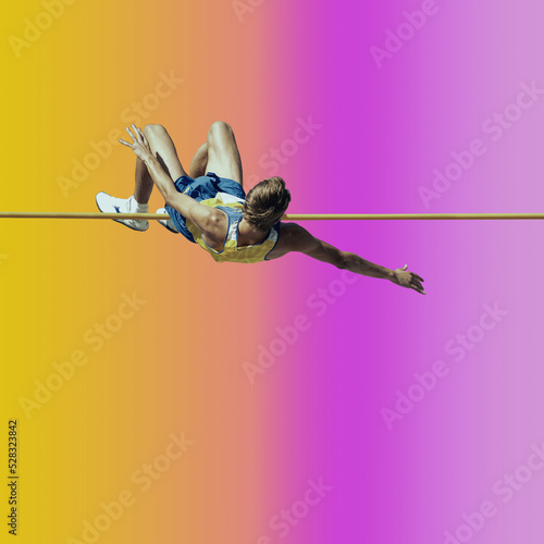 Professional male pole vaulter on background in neon light. Concept of sport, healthy lifestyle, action, movement, motion.