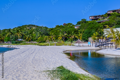 Beautiful  pristine and Turquoise Maputo beach at Bilene with a lagoon and Indian Ocean meeting