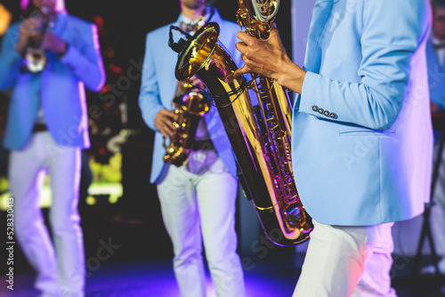 Canvas Print Concert view of saxophonist, a saxophone sax player with vocalist and musical ba
