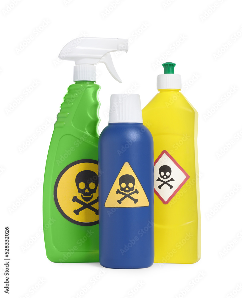 Bottles of toxic household chemicals with warning signs on white background Bottles of toxic household chemicals with warning signs on white background