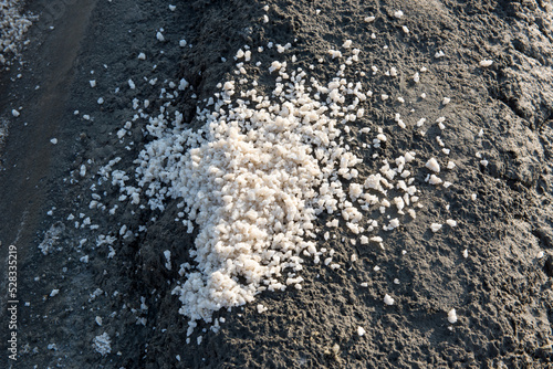 Sea salt with saline on nature background. © wasanajai