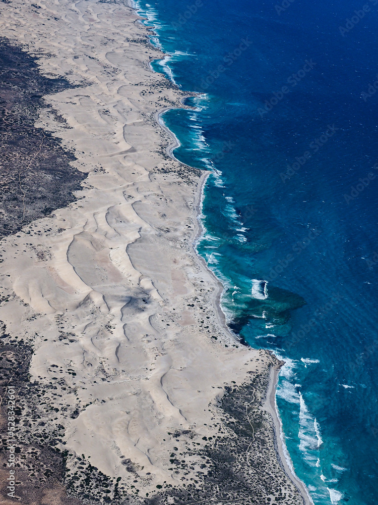 Aerial view of cliffs over Great Australian Bight with sand dunes