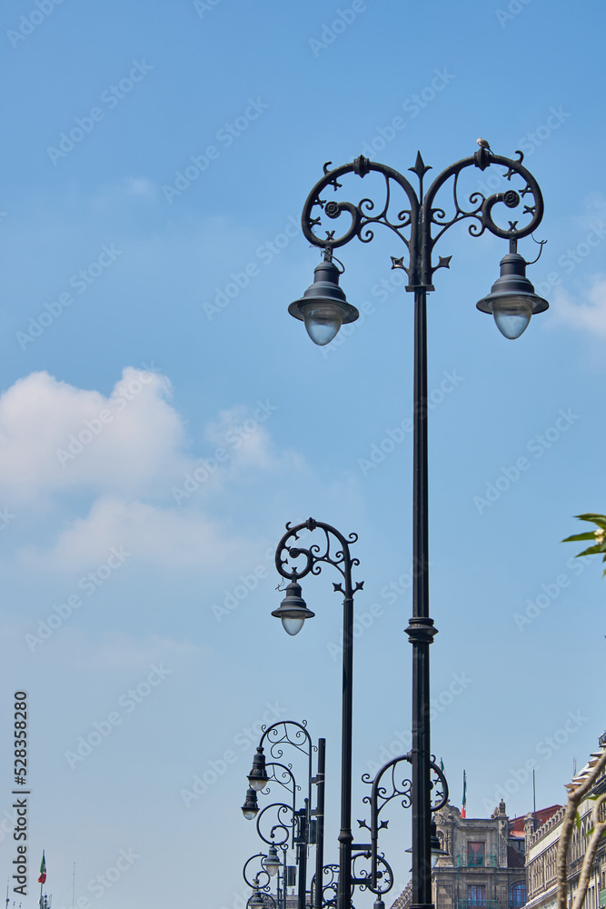 beautiful street lights with a blue sky in the background