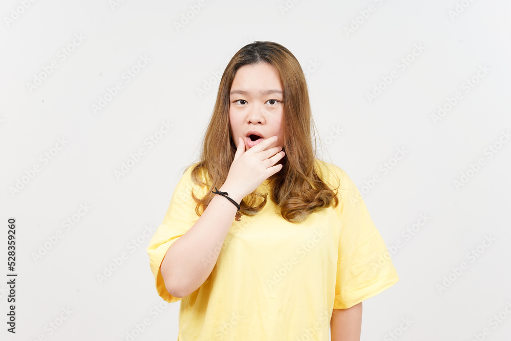 WOW Face Expression of Beautiful Asian Woman wearing yellow T-Shirt Isolated On White Background WOW Face Expression of Beautiful Asian Woman wearing yellow T-Shirt Isolated On White Background
