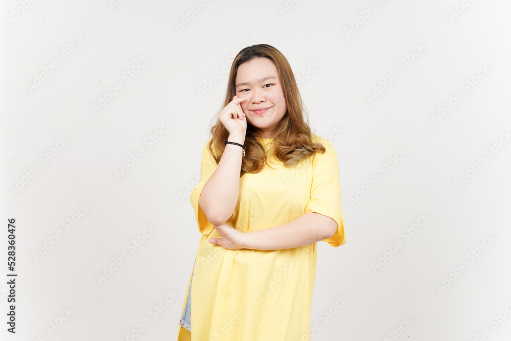 Showing Korean Love Finger of Beautiful Asian Woman wearing yellow T-Shirt Isolated On White Showing Korean Love Finger of Beautiful Asian Woman wearing yellow T-Shirt Isolated On White
