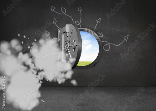 Foto Open safe in black wall with arrows