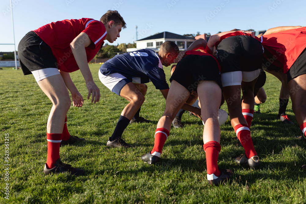 Rear view of rugby players waiting for the ball Rear view of rugby players waiting for the ball