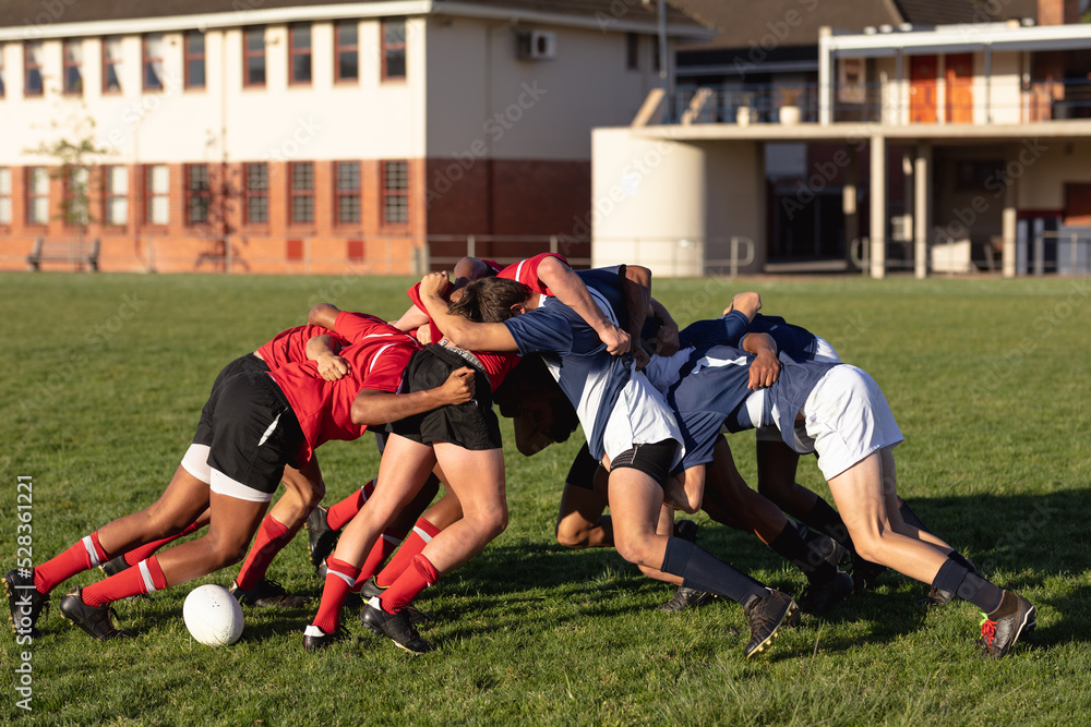Rugby players in a scrum during a match Rugby players in a scrum during a match