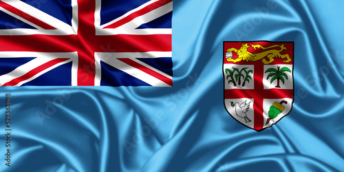 Fiji waving national flag close up silk texture satin illustration background.