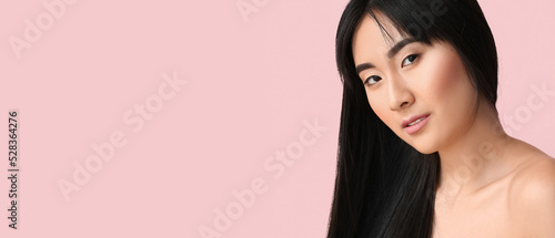 Young Asian woman with beau...