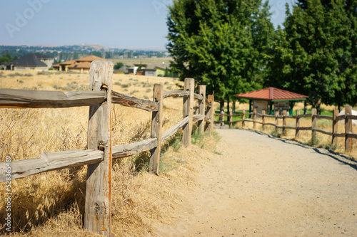 Wooden fence along footpath #528365469