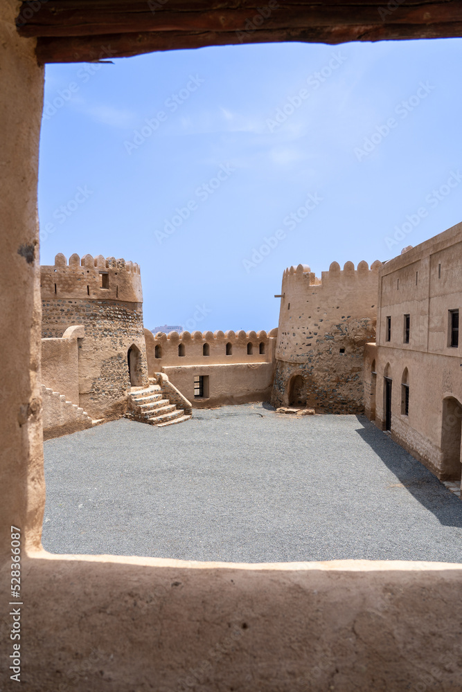Portrait photography of an old stone  English fortress in the United Arab Emirates on a clear day