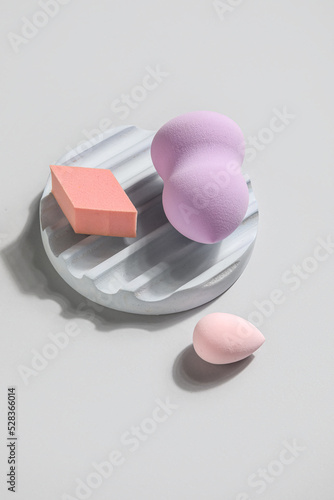 Assorted makeup sponges and...