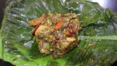 Chicken Pollichathu with banana leaf Top view full HD Footage photo