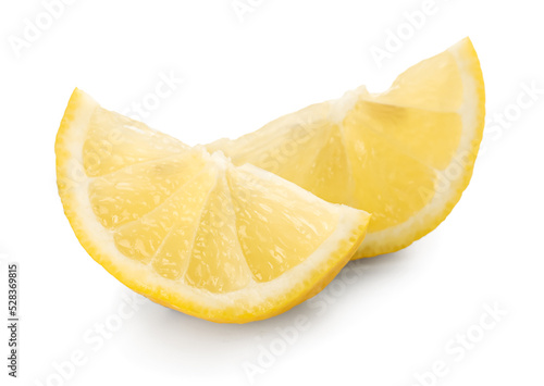 Slices of ripe lemon isolated on white background
