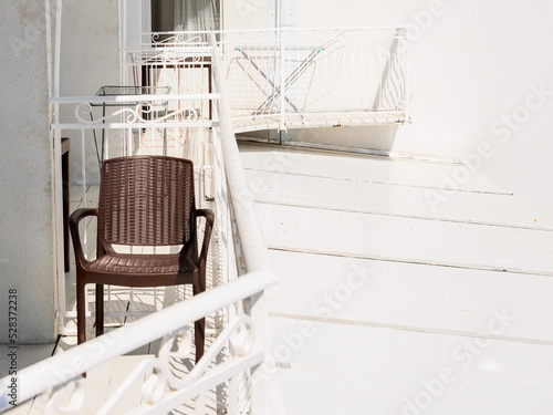 Wicker chair on the balcony