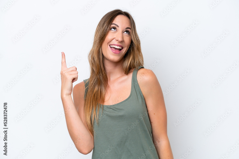 Young caucasian woman isolated on white background pointing up and surprised Young caucasian woman isolated on white background pointing up and surprised