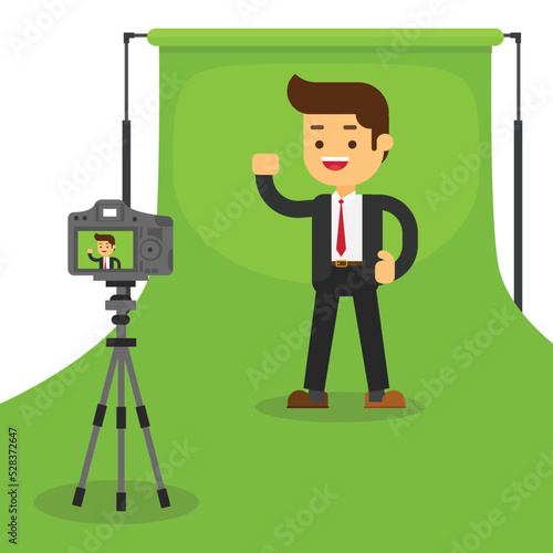 A man in front of camera recording a video to share it in internet
