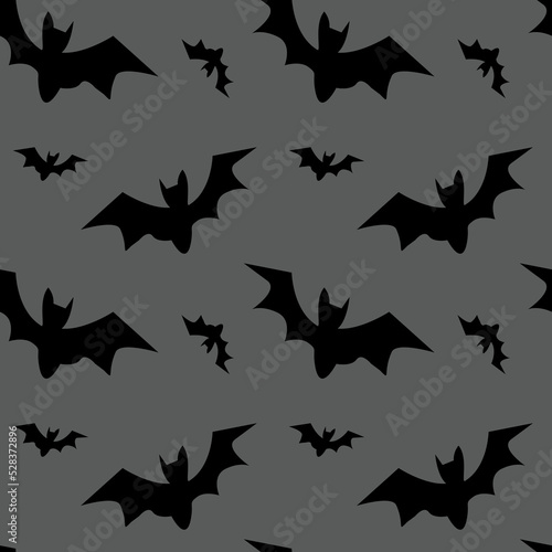 Vector seamless pattern with flying bats. Halloween wallpaper.