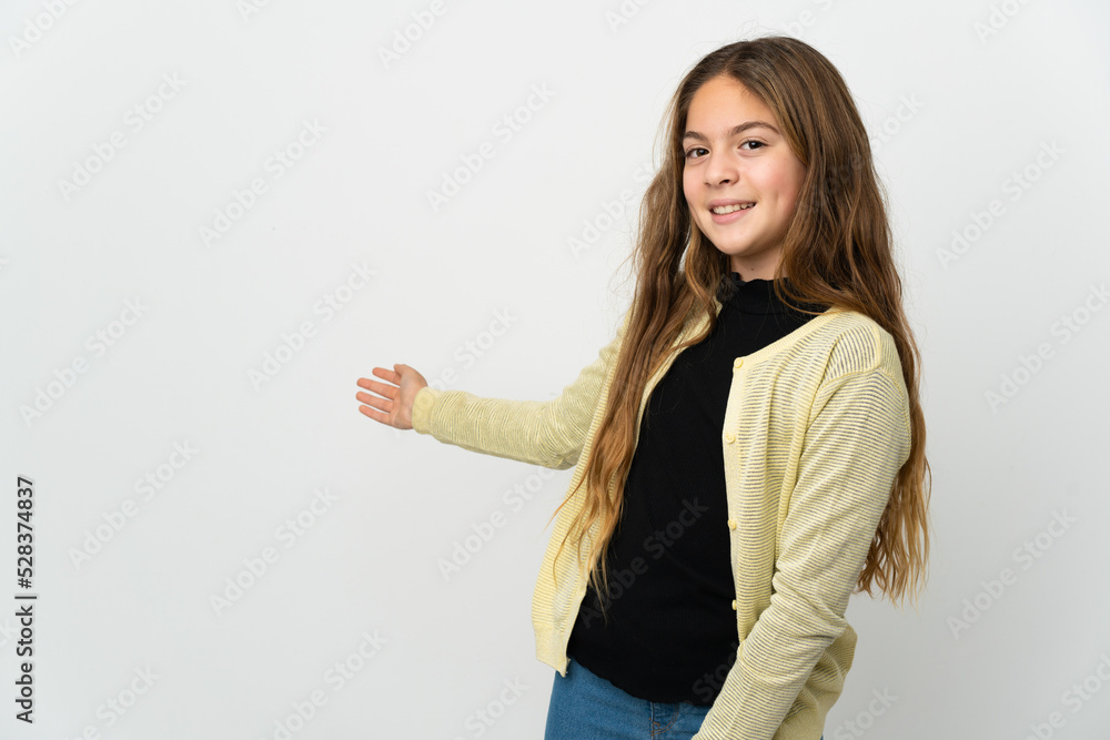 Little girl over isolated white background extending hands to the side for inviting to come Little girl over isolated white background extending hands to the side for inviting to come
