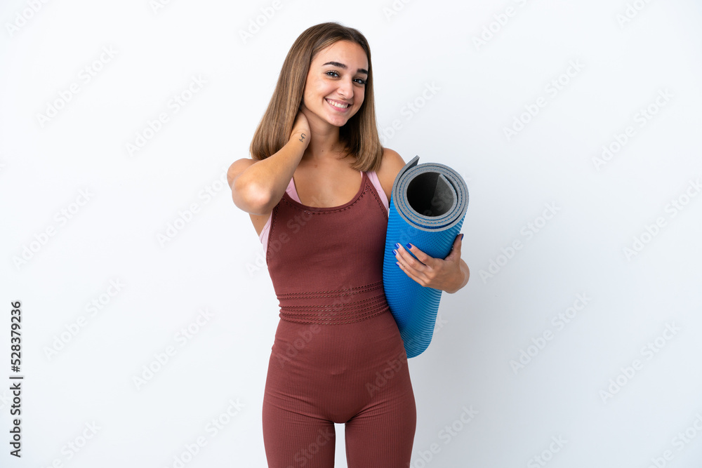 Young sport caucasian woman going to yoga classes isolated on white background laughing Young sport caucasian woman going to yoga classes isolated on white background laughing